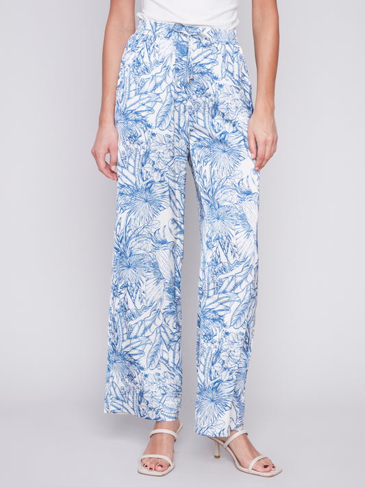 A woman wearing Charlie B's Printed Satin Wide Leg Pant.