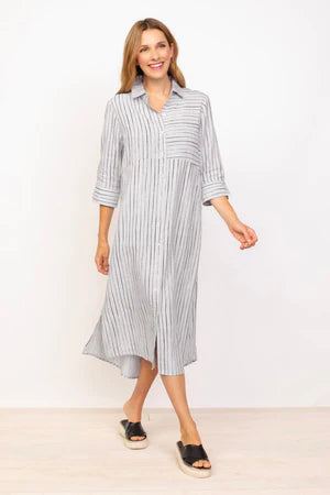 Woman posing in a Habitat 3/4 Sleeve Striped Shirt Dress with notched cuffs and black sandals against a plain background.