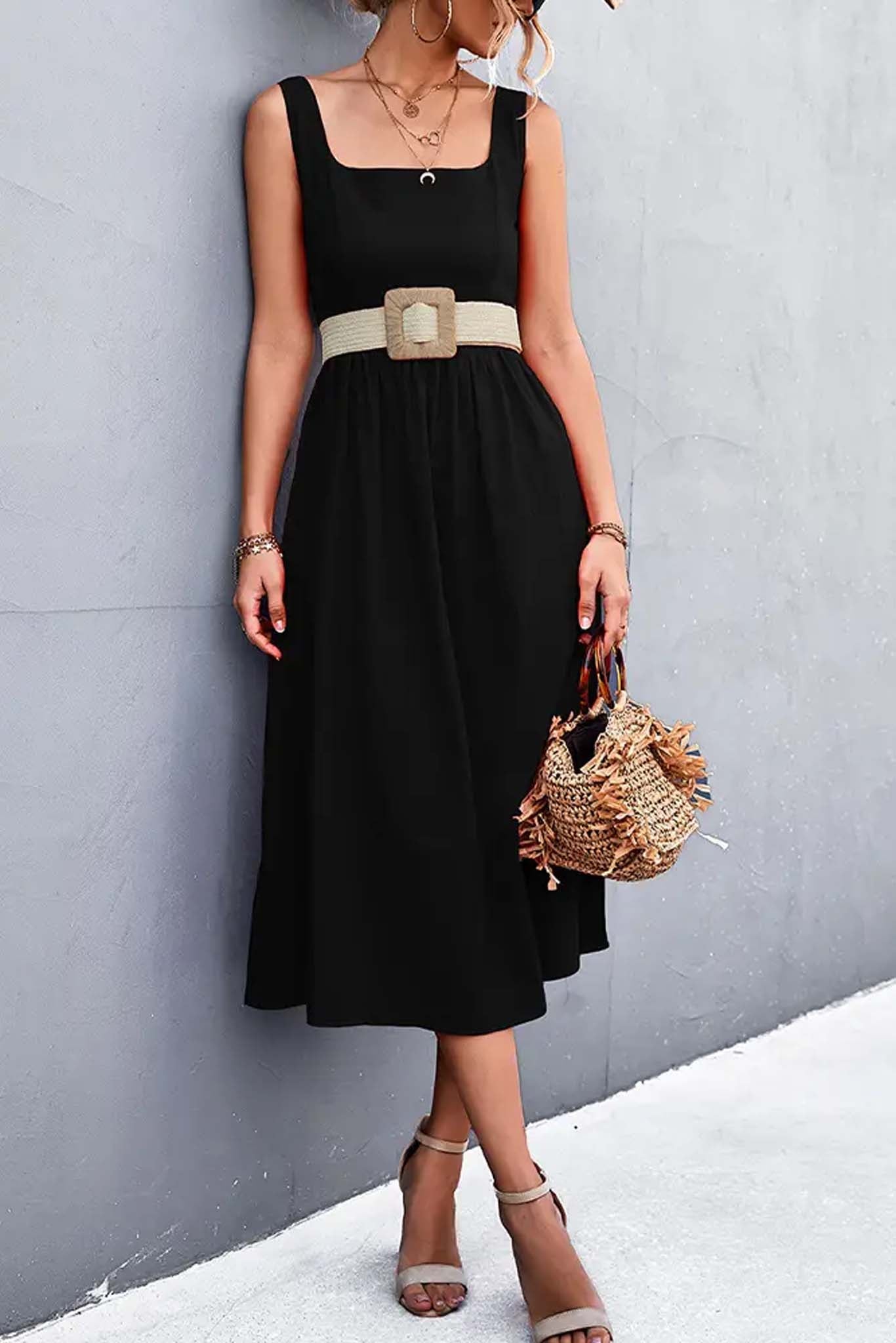 A woman wearing a Square Collar Sleeveless Solid A Line Midi Dress in Black color from Don't Be Chy Boutique.
