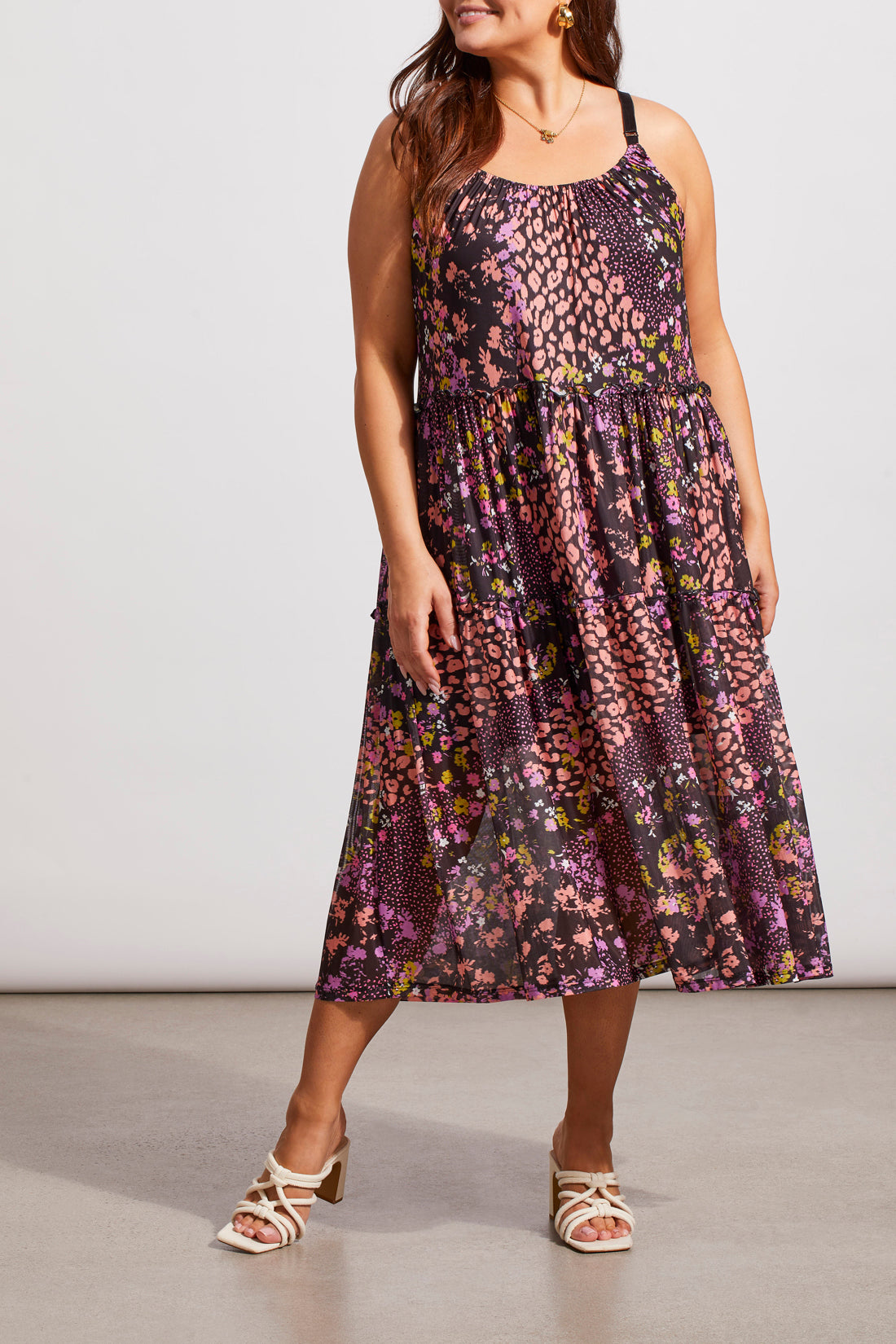 Rear view of a woman wearing a Tribal Two Way Strappy Dress and beige platform sandals, standing in a neutral-toned room.